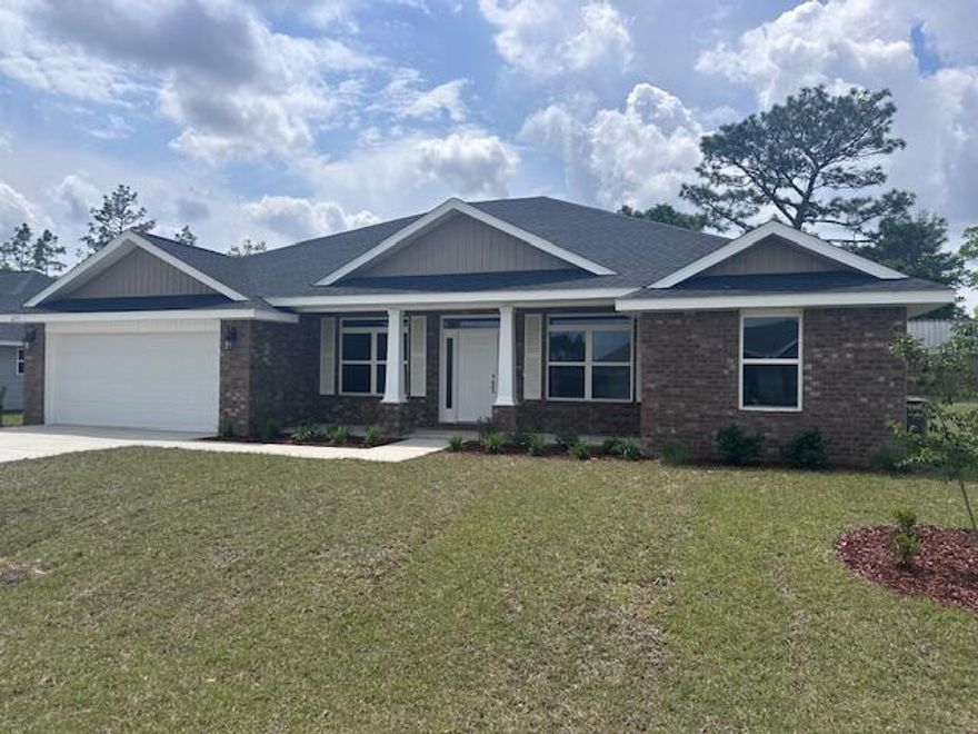 This home features 4 bedrooms, 2 full bathrooms, a formal dining room and a flex room. It is a split be4droom plan. You'll find a very large master bedroom and a master bath with 2 walk in closets, a garden tub and separate shower. Cabinetry is handcrafted and solid wood with attractive brushed nickel pulls. The family room has a cathedral ceiling and double french doors leading out to the covered porch. Walls are painted with a knockdown texture and base boards are 5 1/4'. The exterior is front sided brick with 3 sided vinyl. The garage has an electric door opener and a pull down staircase for storage. The lot is a good size and comes fully sodded and professionally landscaped. Crestview offers ample dining and shopping and is just minutes away!