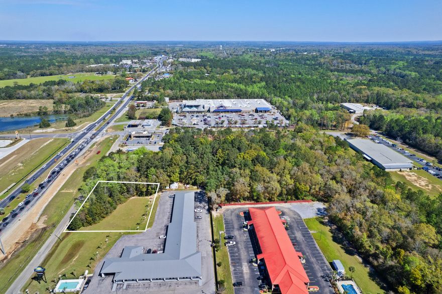 Now available for sale is a prime commercial property in Defuniak Springs. At .80ac this parcel is just north of Interstate 10, on Highway 331, with traffic light access on Hugh Adams Road. It sits adjacent to Lowe's, Starbucks, a future 50-bed HCA hospital and more. AADT is 25,000.