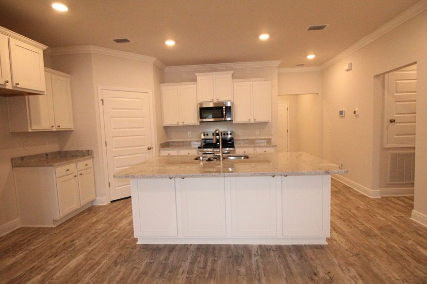 Welcome to Firefly located in Hammock Bay! The Arlington is a 3 bed, 2 bath floorplan that has elegant 9' ceilings, EVP flooring throughout the common areas and frieze carpet in all bedrooms. Beautiful interiors doors with brushed nickel hardware and granite countertops in the kitchen and bathrooms are a few of the added details. The home also features Whirlpool stainless steel appliances which include a free-standing smooth top stove, microwave, and dishwasher. Hammock Bay is located on the Choctawhatchee Bay, and a short drive to the white-sand beaches and emerald waters of the Gulf of Mexico along Scenic Highway 30-A.