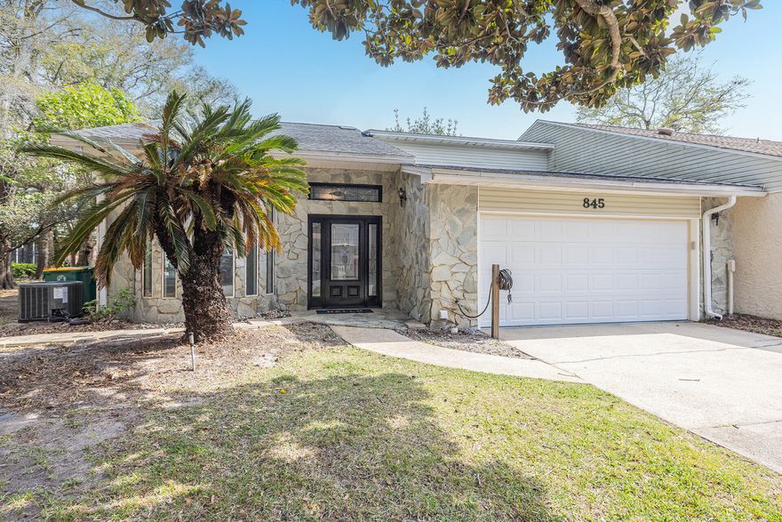 You don't want to miss this Beauty! It has been completely remodeled with 100k in renovations. The stunning updates include life proof luxury vinyl flooring, recessed lighting, brand new top of the line kitchen appliances, fixtures, garage door and motor, brand new kitchen and bathrooms, banister with painted stair treads, whole house painted, doors, trim, outlets throughout and automatic blinds upstairs.  This home has 3 spacious Bedrooms, 3 Baths with two living rooms plus a loft. There is enough room for everyone to spread out. As you enter you will notice the gorgeous floors throughout. The kitchen is a Chef's Dream! There are lots of custom dark cabinets, stainless appliances, walk in pantry with under the stairs storage, luxurious quartz countertops. Right off the kitchen is the spacious formal dining room. The kitchen opens to the living room with wood burning fireplace and sliding glass doors to the back yard. Around the corner is the second spacious living room and there is even a coat closet. The master bedroom is conveniently located on the first floor and has a large walk in closet. The ensuite is striking with a custom tiled shower with a rain shower head, double sinks with waterfall faucets and white shelving for storage. As you go up stairs there is a loft for a great office or play room, 2 Bedrooms and 2 Bathrooms. The bathrooms are shared by each bedroom so every bedroom has their own bathroom. There is a tub/shower combo in the upstairs bathroom. One of the additional bedrooms has barn doors leading to the enormous closet that can be another room as an office or even photography room. Out back there is a privacy fence and patio. You won't believe all the space this home offers. NO HOA FEES!! Close to restaurants, hospitals, Eglin AFB, Hurlburt Field and shopping. 