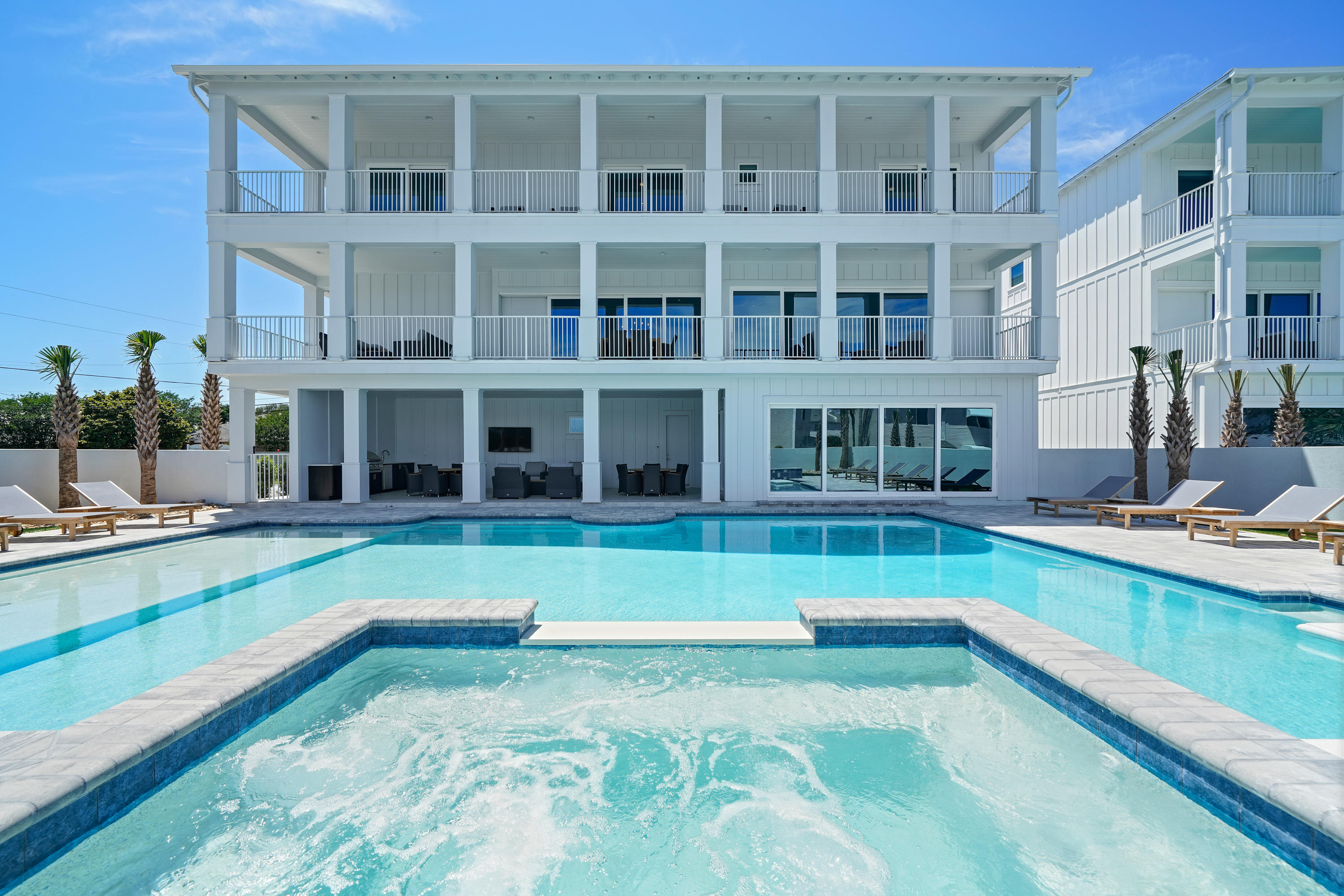 Introducing ''Castawaves,'' a newly constructed 6,333-square-foot 8-bedroom designer showpiece with stunning coastal interiors, state-of-the-art amenities, and a resort-style pool. This luxury beach home is already a significant income producer with $265K in projected annual rental income. No HOA dues. Open-air comforts include a custom-designed LED-lit pool with sundeck, elevated spa, summer kitchen, covered outdoor dining, four terraces, and rooftop deck, offering sensational sunset vistas. Lifelike synthetic turf provides zero maintenance and year-round beautification. This home has all the essentials for entertaining - ample parking, large gathering spaces, seamless indoor-outdoor flow, and a lavish chef's kitchen - plus a private movie theatre and fully equipped game room.