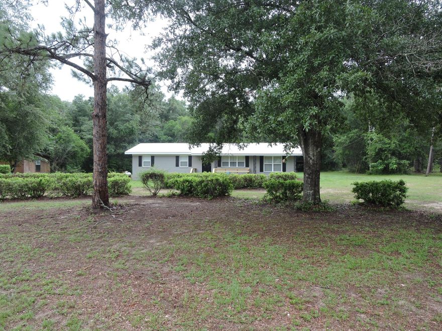 Available NOW! Recently remodeled from top to bottom with upgrades galore!  The main house has the beautiful original real hardwood flooring sanded and resealed.  The kitchen has been completely redone with new cabinets, countertops, and appliances.  A new utility room was added with laundry center and additional cabinetry for storage/pantry.  The new master suite has a walk-in shower, new vanity and walk in closet.  The additional bedrooms are nice sized with ample closet space.  The home has covered front and back porches to relax and enjoy your morning coffee.  Schedule your provate showing today!