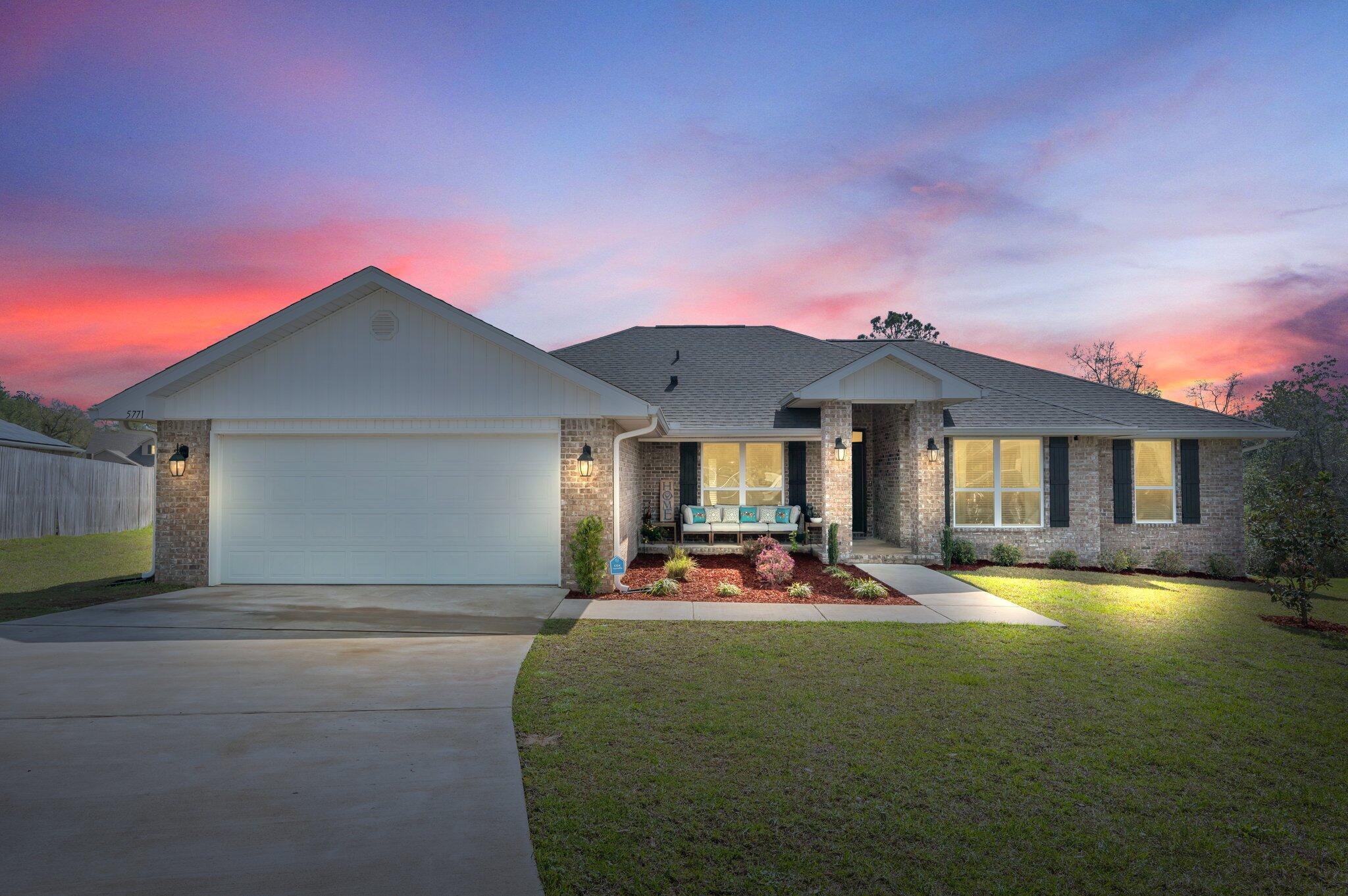 VA Assumable mortgage at 2.75%! The cheeriest house on the block-welcome home! Fully brick, almost new, and spacious too! 4 bedrooms, but a HUGE fifth space. Builder called it a second living room, but the Sellers put their own spin on the space with adorable barn doors making it the perfect guest room, play room, or office! Formal dining, open kitchen to a coveted breakfast nook, and large exterior deck for entertaining. All situated on close to a half acre, backing up to woods! Cul-de-sac location, community pool and playground too.