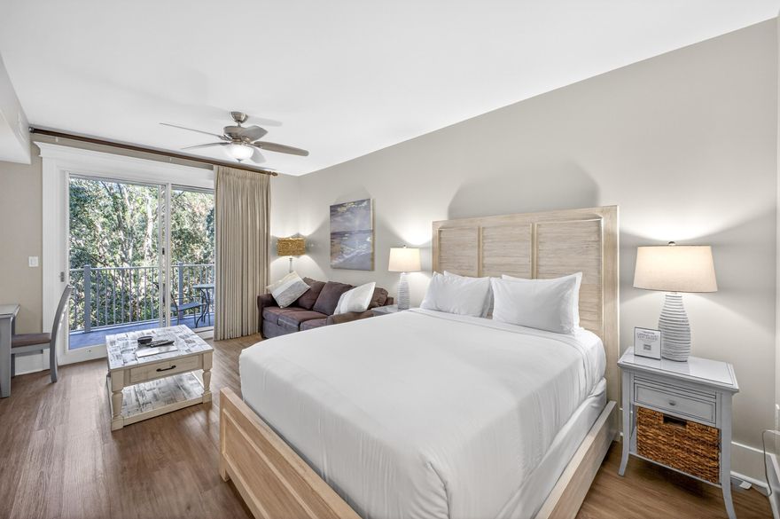 This fully furnished studio offers a spacious private balcony with tranquil views overlooking the Grand Garden. The unit features durable LVP flooring and comes complete with a kitchenette, dining table, sleeper sofa, and a full bathroom. A separate owner's storage cage in the garage provides convenient space for beach chairs, toys, and additional storage. Recent upgrades include a new HVAC and water heater. Ideally located near the vibrant dining, shopping, and entertainment of Baytowne Wharf and the Conference Center, the property also offers easy access to the beach via shuttle or golf cart, along with all the amenities Sandestin Resort is known for. Community amenities include a gated underground parking garage, a zero-entry lagoon-style pool, hot tub, children's pool, fitness room, and exclusive access to the private Solstice Club on the Bay, featuring a large grill, outdoor gas fireplace, indoor bar, and inviting indoor and outdoor seating areas.

In addition, Hotel Effie is just a few steps away with a rooftop pool and bar and fine dining at Ovide. Owners also have access to the private Solstice Club, an amenity for owners and their guests, featuring grills, screened porch with gas fireplace, indoor bar, flat screen TV and comfortable seating inside and out.
As an introduction to the Sandestin lifestyle, we invite our new owners to explore amenities that make Sandestin special. The listing brokerage and seller(s) are presenting the buyer(s) of this property with (2) 90-minute rounds of Tennis court time, a golf foursome at one of our three championship courses, and a round of golf for up to four (4) players at the unrivaled Burnt Pine Golf Club.
Sandestin Golf and Beach Resort features more than seven miles of beaches and pristine bay front, four championship golf courses, 15 world-class tennis courts, a 226-slip marina, a fitness center, spa and celebrity chef dining. Shop, dine and play at the charming pedestrian village, The Village of Baytowne Wharf and more. Inside the gates of the resort, residents enjoy a balanced lifestyle of high-class living, spanning the 2,400 acres from the beach to the bay. Everything within the gates of the resort is accessible by golf cart or bicycle. The entire resort is interconnected by miles of pedestrian, bike and golf cart paths that weave through groves of live oaks, meandering past natural lagoons, fountains, man-made lakes, and meticulously landscaped fairways.
