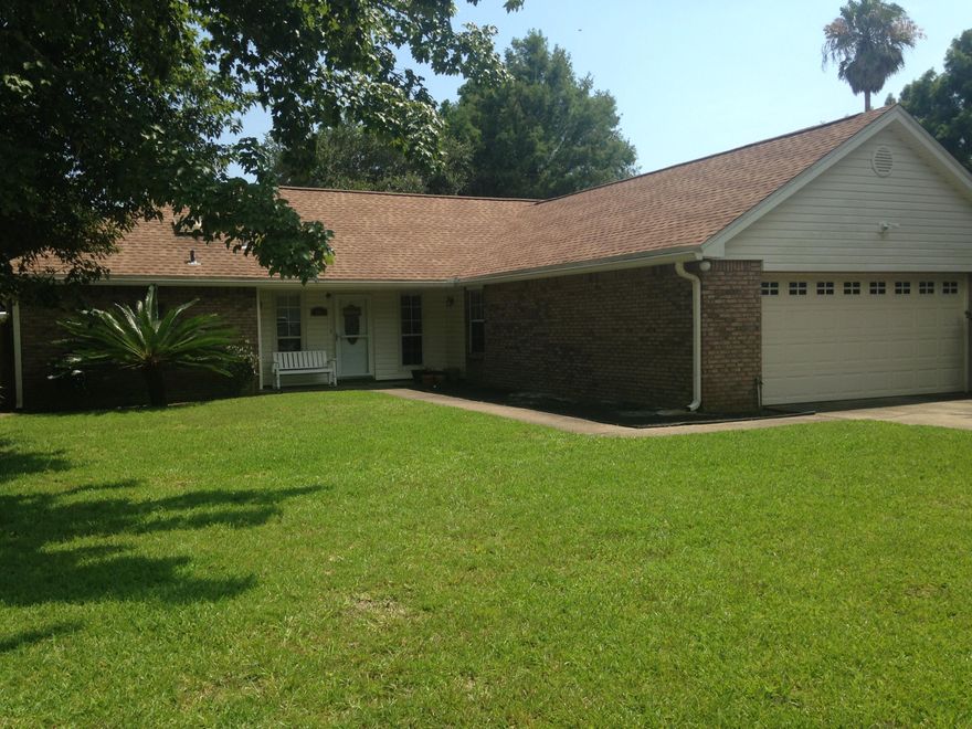 Fantastic Home in the desirable Overbrook Neighborhood. Spacious living room with vaulted ceiling, fireplace with custom mantle and tile flooring throughout. Large dining area adjoins the beautifully appointed kitchen with granite counters and stainless appliances. French doors lead out to a covered patio and a big back yard, all privacy fenced. Plenty of play space and a storage building! Split floor plan has a large master bedroom, bath with double vanity and his and her closets. Two guest bedrooms and a hall bath on the other side of the home. Laundry/Mud Room leads to a double car garage. Many updates have been done to this home over the last few years: New appliances in 2009, AC System replaced in 2010, new roof in 2012 - just to name a few. Exterior wood siding in back and side of home needs attention, property is being sold "As Is" so the Buyer can repair or replace as necessary.