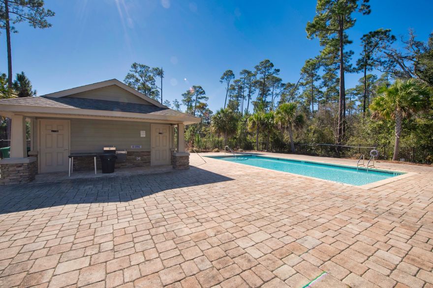 4 BEDROOM POOL TOWNHOUSE. Just a short walk down the sidewalk and the beach is right there! (Situated on a cul-de-sac road)This home has fresh paint, crown molding, new flooring, granite and cherry wood cabinetry throughout. The main master room is on the 1st floor and the second master is the largest room that has an ensuite bathroom! There are views from this room to the pool as well. Levolor shades are located in 3 bedrooms, and the master and LR have bamboo. The home features a shed out back with shelving as well. Inside the home features a stackable washer and dryer that will convey with the purchase. The new carpet is on the stairs and hallway upstairs only and the rest of the home is new vinyl flooring or large tiles. This home is move in ready for a new homeowner! RING doorbell!!