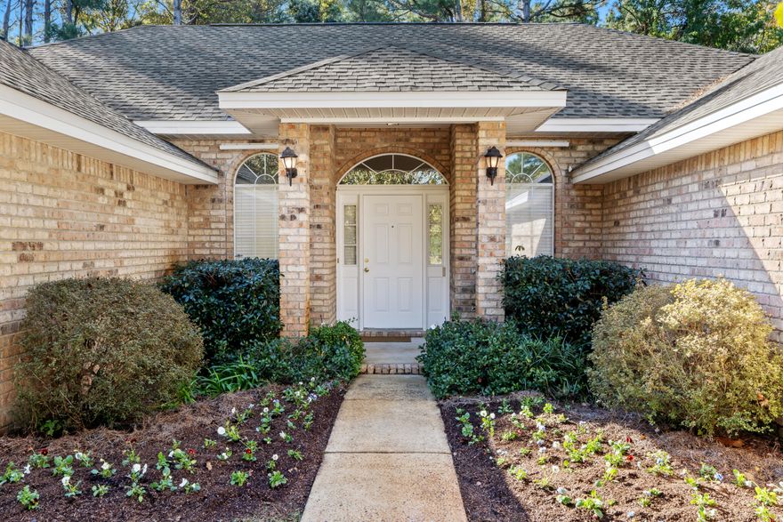 This home will not be on the market long! Discover your dream home in a very desirable area of Destin conveniently located near beaches/bay, shopping, dining and schools offering the perfect blend of relaxation and entertainment.  As you enter this split-floor plan one level brick home, you'll be welcomed by an open dining room, which is opposite a sitting room/or office then enter the spacious living room with vaulted ceiling and a gas fireplace. The layout flows into a breakfast area and a large kitchen equipped with an island and plenty of cabinetry with powder room and laundry room as well. This 2,625 sq. ft. home features a spacious master bedroom suite with bath complete with separate vanities, a walk-in shower, and tile floors. One large walk-in closet and one linen closet provide ample storage space.  The opposite side of the hall is a completely separate apartment or additional bedrooms including a full bath, kitchenette with stackable washer/dryer in pantry and two rooms-bedroom and sitting room. This area has its independent HVAC unit for comfort control.  This home is being sold fully furnished and features a generator, hurricane shutters and in-line HVAC Dehumidifier.  The private backyard is a retreat within itself, backing to a wooded preserve.  Eagles Landing Community located off of very desirable Indian Trail is a very well maintained community with a low HOA fee of $525 annually and a community pool. Recent home inspection completed on January 20, 2025, and available upon request to serious buyers!  Don't waitschedule your private showing today!