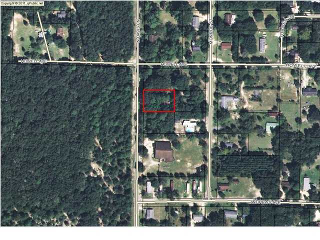 Nice city lot located in a quiet older subdivision. City water and sewer is available to this lot. Only site built homes or true modular homes are allowed. The lot located behind this one is for sale by the same owner and fronts on Monroe St. Purchase this .34 of an acre or both to make a wonderful homesite!