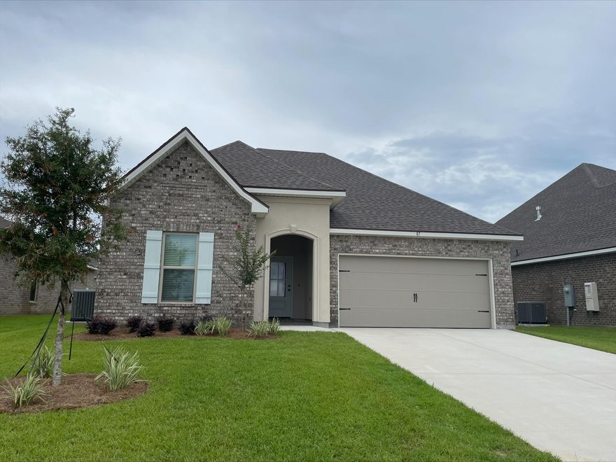 The TRILLIUM IV A in The Bluffs at Lafayette community offers a 3 bedroom, 2 full bathroom open and split design. Upgrades added (list attached).Special Features: double vanity, garden tub, separate shower, and walk-in closet in master suite, master closet continues through to laundry room for added convenience, kitchen island, walk-in pantry, covered front and rear porch, recessed lights, crown molding, framed mirrors in bathrooms, undermount sinks, landscaping, architectural 30-year shingles, flood lights, and more!Energy Efficient Features: tankless gas water heater, kitchen appliance package with gas range, vinyl low E windows, and more!