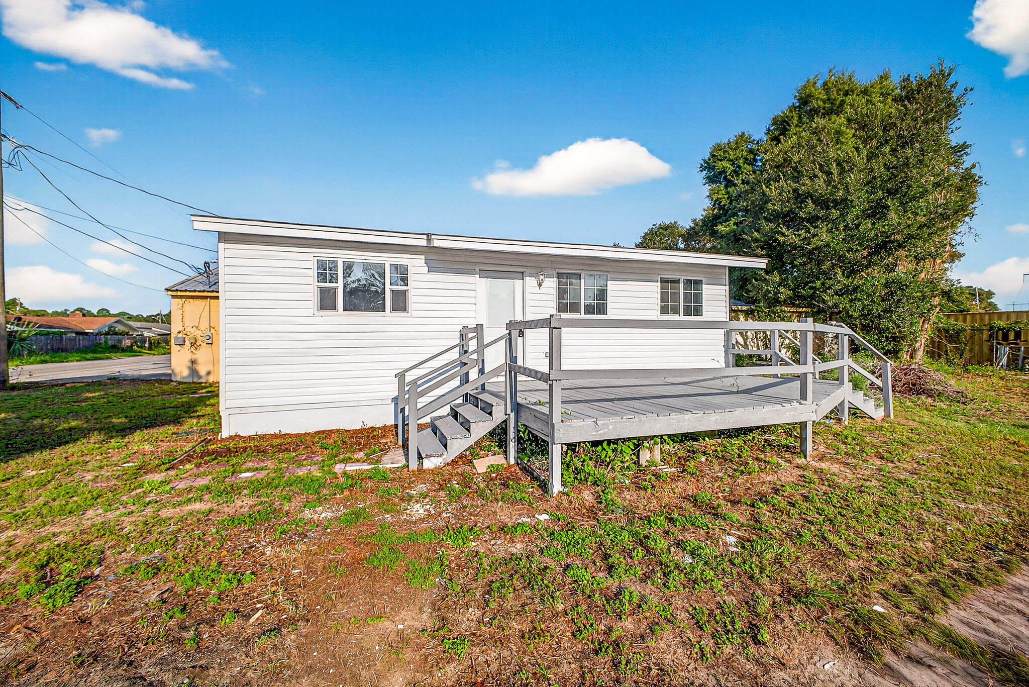 393 Lowery Drive in Fort Walton offers a charming two-bedroom, one-bath home situated on a .20-acre lot. Originally built in 1985, this property has been fully renovated inside with fresh paint, updated flooring, new doors, modern light fixtures, and beautifully refreshed kitchen and bathroom spaces. A brand-new HVAC unit, installed less than a month ago, ensures year-round comfort. Conveniently located near shopping and everyday amenities, the home provides both accessibility and privacy, with the benefit of not being directly surrounded by neighboring properties.