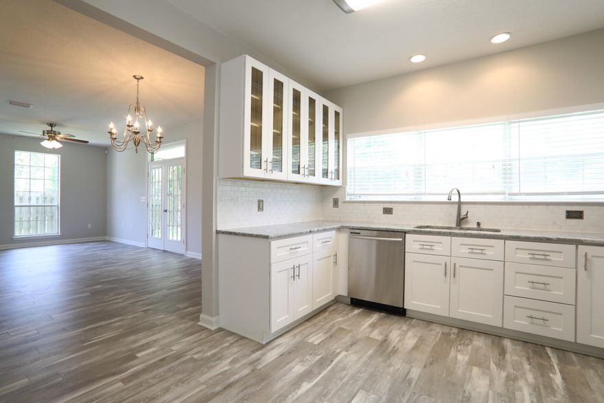 **NEW CUSTOM KITCHEN,BATHS,GRANITE,PAINT,CUSTOM FLOORS,CARPETS,FANS AND LIGHTS**One of the largest custom homes in the sought-after Escada. Amenities include community pool, tennis court, clubhouse, basketball court and a lake. Take the well traveled path to 30A, walking or biking to Butler Elementary/Emerald Coast Middle Schools or to the Stallworth Lake public beach access. Enjoy your privacy walking through your French doors onto your large, covered, rear patio overlooking your lushly landscaped BIG yard backing up to protected state forest.