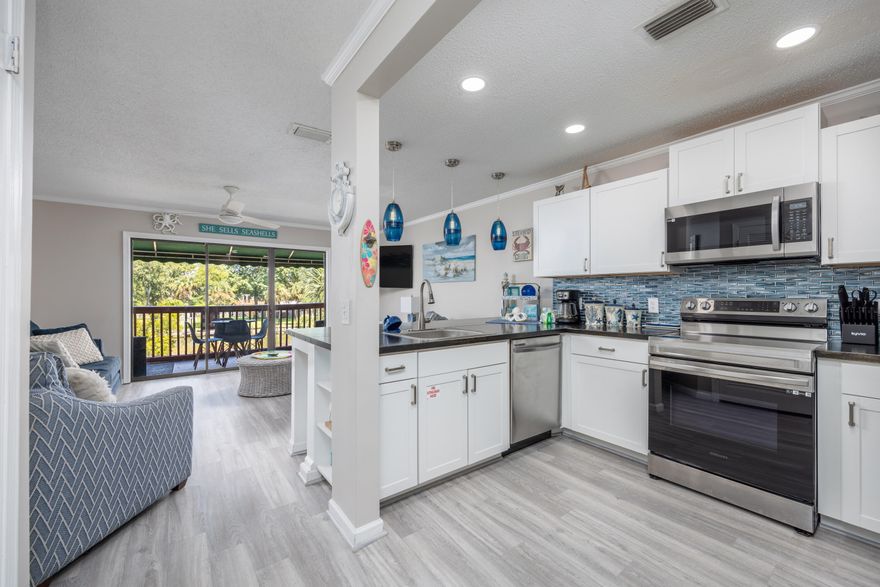 Welcome to the epitome of luxury living at the Villas of St. Thomas for an unheard of price for a beautifully renovated condo! This exquisite 2-bedroom condo with a bonus loft area used as a 3rd bedroom, has recently undergone a stunning renovation. Overlooking the serene lagoon, this residence provides a tranquil retreat where you can unwind while enjoying picturesque water views. The spacious living area is bathed in natural light, creating an inviting ambiance for relaxation or entertainment. Step onto your private balcony and immerse yourself in the beauty of the surroundings - a perfect spot for morning coffee or sunset cocktails. Located in the heart of a vibrant gated community offering easy access to a myriad of attractions. Embrace the sun and sand with convenient beach access!