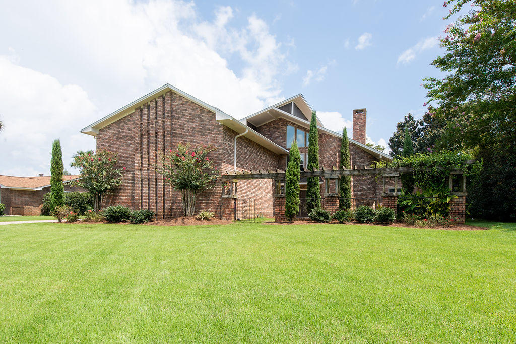 LOCATION LOCATION LOCATION! Welcome Home to your new Golf Course Lifestyle. You are going to love this family friendly waterfront neighborhood and all it has to offer. This 4500 sq ft Custom Built two-story Home is perfect for a growing family. As you enter the New Orleans style courtyard you are welcomed by a beautiful secret garden perfect for afternoon tea. Notice the landscaping has been upgraded with low maintenance Zoysia Empire grass and shrubbery and a new sprinkler system to keep