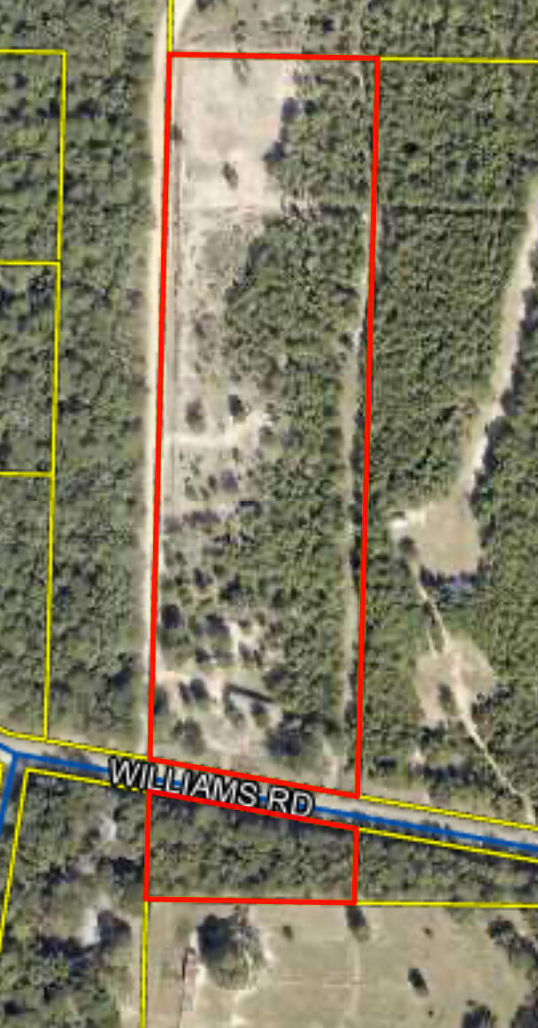 Located just 10 minutes from downtown DeFuniak Springs, this improved 10 acre parcel is ready for your home! The hard stuff has already been done, well, septic and power pole are in place. Approximately two thirds of the property is fenced and cross-fenced, creating five containment areas for use. Buildings on the property do not convey. This would be a blank slate waiting for your vision!