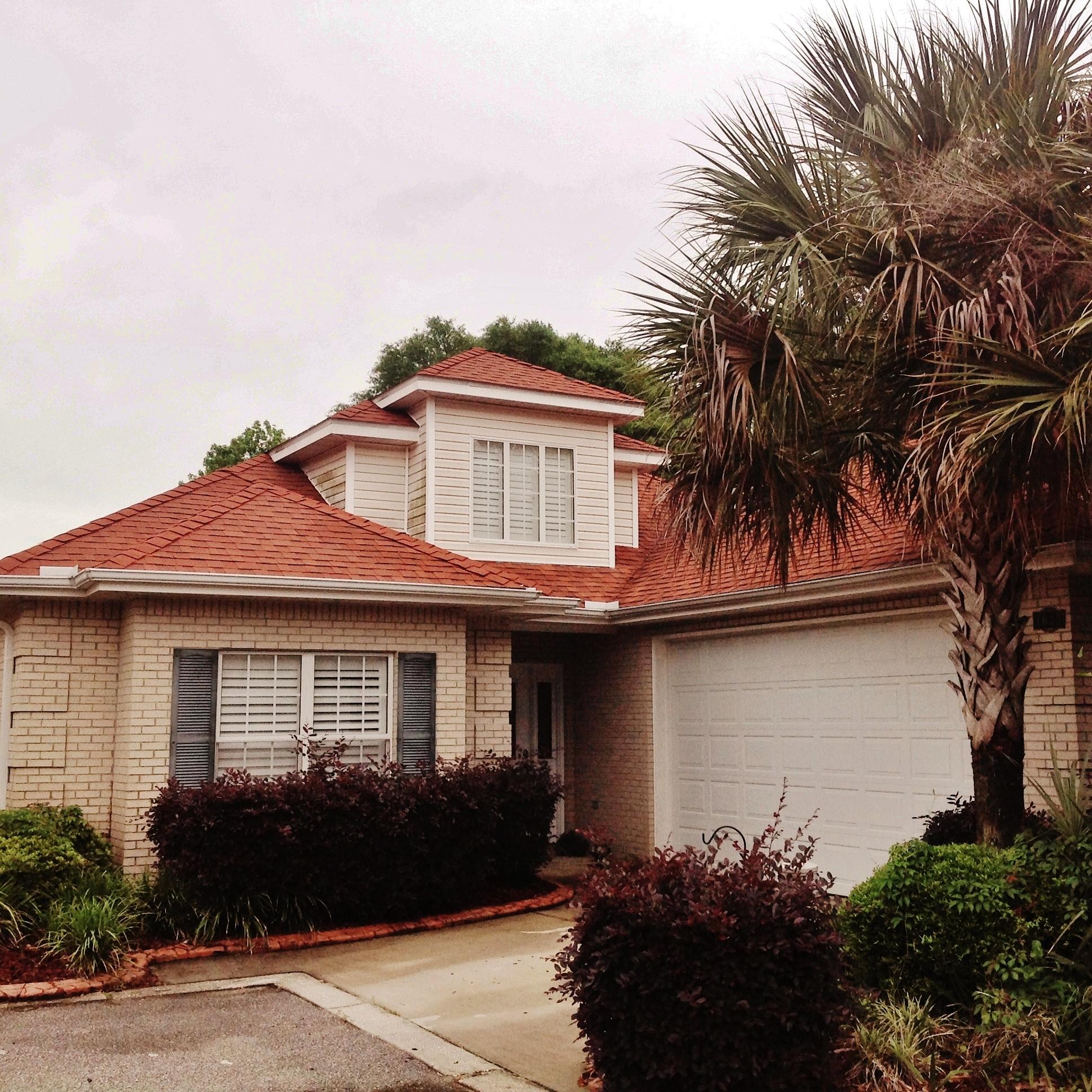 SWEET Patio home located in the Mediterranean Village area of gated Magnolia Plantation within Bluewater Bay. This all brick beauty has a tiled entry with raised ceilings and abundant windows with custom plantation shutters in every room. Dining room has a beautiful architectural coffered ceiling. Large kitchen is open to the living room and features corian counter tops and wrap around breakfast bar, smooth top stove, built in microwave and pantry. Living room has gas Fireplace surrounded with decorative arches and built in shelves, and plenty of space for your flat screen TV. A wet bar is great for entertaining! Split bedroom floor plan features Master Bedroom with trey ceiling and double doors that lead to indulgent Master bath with jetted tub, separate shower, double vanities and walk