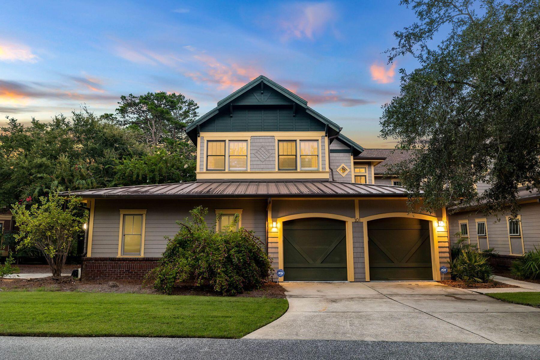 Experience the perfect blend of condominium convenience with the privacy and comfort of a single-family home at Linkside in Wild Heron. Step into this beautifully updated Coastal Retreat, which comes fully furnished and offers stunning waterfront views of the pond.As you enter, you are greeted by a spacious entryway with a generous storage closet, leading into a home adorned with beautiful plantation shutters throughout. The living room, kitchen, dining room, and den feature hardwood floors, creating a warm and inviting atmosphere. The cozy den includes a TV and a sleeper sofa, perfect for guests or movie nights. Step into the Florida room with upgraded LVP flooring and enjoy peaceful views of the pond, a perfect space for relaxation or entertaining. The primary bedroom offers a king bed, direct access to the sunroom, a main closet, and two additional storage closets. The primary bathroom includes a double vanity, granite countertops, a luxurious tub, and a tile shower for a spa-like experience.

The dining room comfortably seats ten, making it ideal for large gatherings, while the kitchen boasts stainless steel appliances including an LG electric stove and microwave, a Samsung refrigerator, and a Bosch dishwasher. The soft-close cabinets, butcher block island and granite countertops add a touch of luxury to this chef's kitchen.

One guest bedroom features two queen beds, a large closet, and vaulted ceilings, while the additional guest bedroom offers two sets of twin bunks and a closet, perfect for families or visiting friends. The guest bathroom includes a tile shower/tub combo, double vanity with granite countertops, and a linen closet for added convenience.
Additional features include a two car garage, a laundry room with a sink, and ample storage throughout to keep your home organized and clutter-free. The Linkside complex offers its own pool, just 100 yards from the condo, in addition to the community pool at the Wild Heron amenity center. 
Living in Wild Heron, a protected nature preserve, provides a peaceful escape from the density and tourist traffic of other nearby locations. It offers superior amenities like the resort style swimming pool, hot tub, fitness center, dock, nature trails, and the crystal-clear waters of Lake Powell. Golf lovers will enjoy the convenience of Sharks Tooth Golf Course located within Wild Heron. Golf and tennis memberships are available through the Watersound Club.
