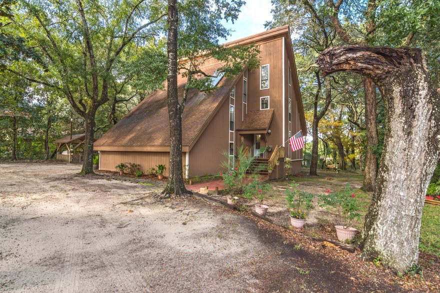 72 Hour First right of refusal in place. Available now is this versatile home located on an oversized, nearly half acre lot with plenty of room for fun and play. This home is nestled between clusters of beautiful trees and features 4 bedrooms and 4 full bathrooms on a corner lot in the private cul-de-sac community of Baywood Estates in central Niceville. With more than 2,600 square feet of heated and cooled space, there is plenty of room for the entire family, both inside and outside. In 2005, a Mother-In-Law Suite was added with its own private entry and ramp for accessibility. There is a finished screened in porch off the MIL suite and a large open deck off the living room as well as a separate gazebo with room for a grill, table and chairs and has lights and receptacles.