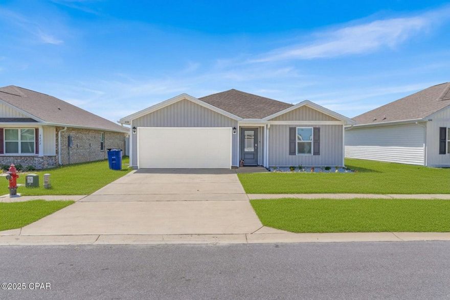 **MOTIVATED SELLER!!**Welcome to a beautifully designed 4-bedroom, 2-bath home in Liberty's vibrant community, offering modern living just minutes from the sugar-white sands and emerald waters of Panama City Beach. Built in 2023, this home feels fresh and inviting from the moment you arrive, with a thoughtful single-level layout perfect for everyday living and entertaining. Inside, natural light and upgraded finishes set the tone. The open living area flows into a bright kitchen with stainless-steel appliances, a central island, and crisp cabinetry--an ideal spot to gather with friends and family before heading out for a day on the Gulf. The primary suite provides a quiet retreat with a walk-in closet, while three additional bedrooms offer flexible space for guests, a home office, or hobbies. Step outside your door and enjoy resort-style amenities including a pool, clubhouse, playground, and fitness center, or take a short drive to world-class beaches, local dining, shopping, and endless outdoor adventures along the coast. Whether it's a day of boating, fishing, or simply relaxing on the shore, this location connects you to everything that makes the Florida Panhandle lifestyle so appealing. This is more than a homeit's a chance to enjoy the very best of coastal living in a welcoming neighborhood.