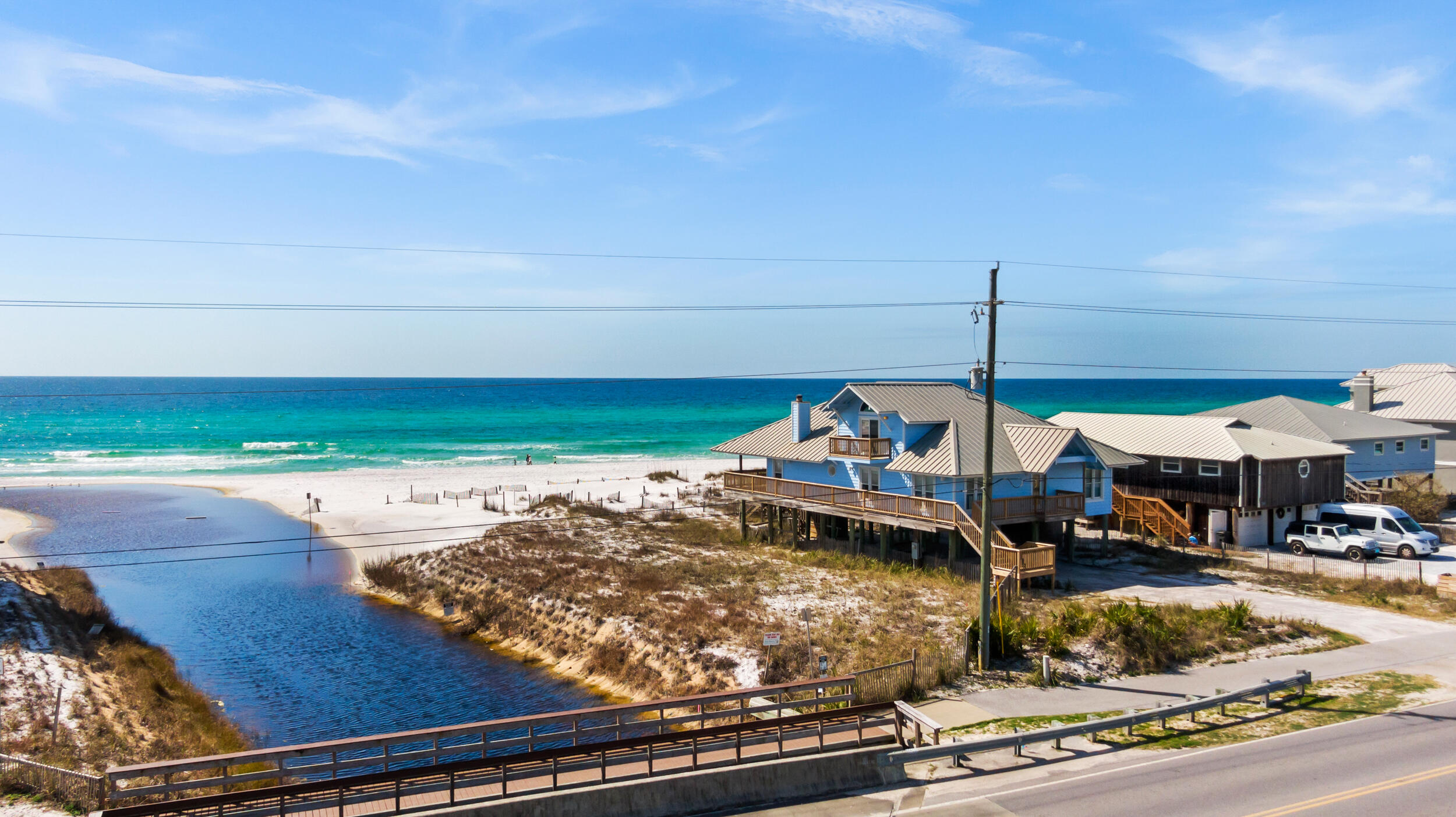 Beach living & panoramic gulf views, on one of the largest non HOA lots on the west side of 30A. Unique two-sided waterfront advantage with oyster lake outfall being available for under ages that need calmer waters. Come view it and call it your beach home! Priced at beachfront comparable lot price. Home listing #917952.Setback determinations from outfall, gulf, side and roadway have been provided by county and can be provided upon request.