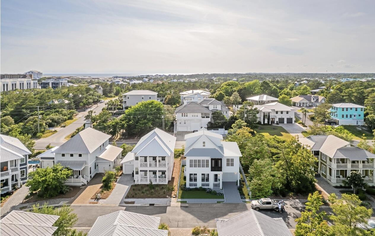 Ideally located in Blue Mountain Beach less than a quarter of a mile from the beach access, this home offers outstanding access to enjoy all 30A offers including the sugar white sands, emerald waters, world-class fishing, first-rate dining and luxury shopping. This exceptionally designed new construction luxury home offers multiple living spaces, 4 bedrooms, five full bathrooms, one half bathroom, a private garage, and beautiful outdoor space. Buyers will have the opportunity to create a custom home by selecting design finishes throughout the property. The ground level of this abode boasts a grand entrance into the home. Through the foyer,enter the large main living area.