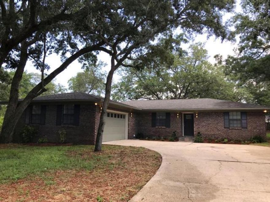 Location, location, location! This totally remodeled all brick home features 3 bedrooms, 2 baths, oversized kitchen, dining room, and a living room with wood burning fireplace. The lot is wooded and located on a cul de sac, so ensures privacy. This home with all the upgrades is a must see and will not last long at this price. There is very limited inventory in this highly sought after neighborhood. The subdivision also has no covenants, codes or restrictions which means no HOA fees to deal with. Call me today for your private viewing !