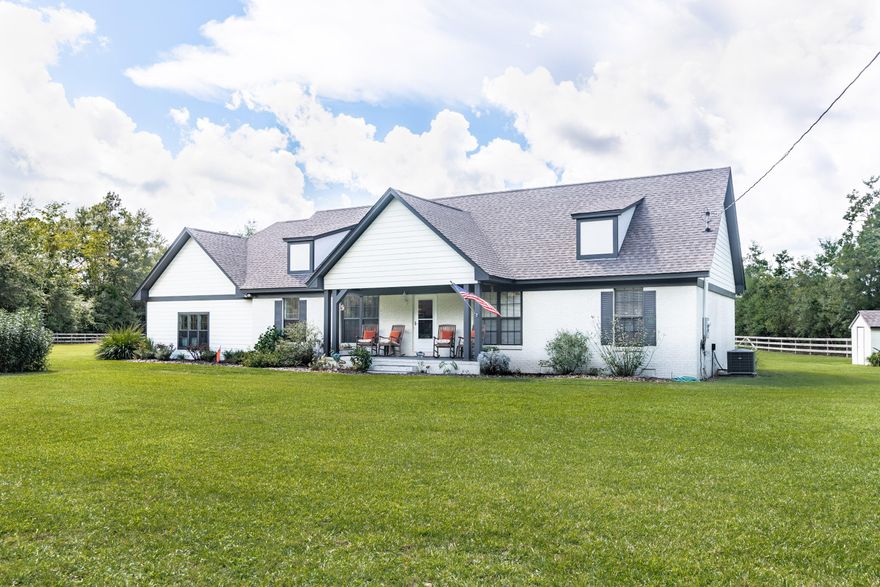 6 1/2 Acres of Peaceful and Tranquil lifestyle guaranteed with this newly renovated 3BR/2BA home. Separate Shop (or Guest quarter) with Double Car Port, oversized Summer Kitchen and Fire pit to enjoy long afternoons overlooking your fresh 40x40 garden, vineyard and natural bamboo preserve. Main house offers bamboo floors and tile in the main living area,Stainless Steel kitchen appliances, beautiful view from your Florida room, large windows for natural light and a lot of storage. Master bathroom has tiled shower with rain shower head and the guest bath has marble countertop and tiled shower/tub combo. The two car garage has shelving and a separate storage room above the garage. 12x47 storage room above the Shop and Double Car Port ready to use.