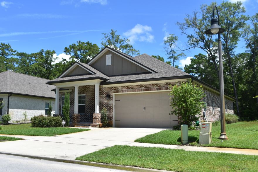 Marina Village is a cute, private, bayou-coastal community, with pool, playground, and direct access Freeport Marina. The Snapper floor plan 2,193 Square Foot, 3 bedroom, flex with laminate flooring, 2 1/2 bath, single story home. Local builder with excellent reputation. Brick exterior, covered entry, 2-car garage and landscaping package with automatic sprinkler system. Interior finishings include, 9 foot ceilings, crown molding main living area and master, cased openings, cased windows in family, dining and master. Tiled master shower and tub deck, double vanity and walk in closet in master. Screen Porch backs up to Preserve area for privacy. Garbage included.