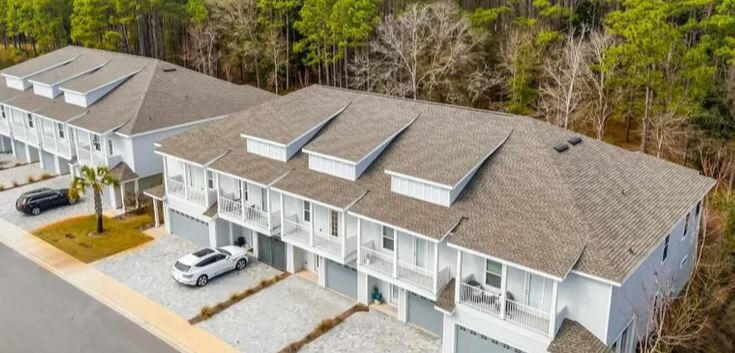 Located just a short drive from the stunning beaches, shops, and restaurants of Santa Rosa Beach and 30A, this beautifully designed townhome offers the perfect blend of luxury and convenience. Nestled in a sought-after community with a pool and adjacent to the scenic 5-acre Kara Lake, this property is an ideal investment or personal retreat. This thoughtfully designed floor plan features three bedrooms, two and a half bathrooms, and a one-car garage. High-end finishes elevate every space, including quartz countertops, stainless steel appliances, LVP flooring throughout, soaring 10-foot ceilings, and 8-foot sliding glass doors. Step into the light-filled entryway, where a flexible foyer space creates a warm welcome. The property also features spacious