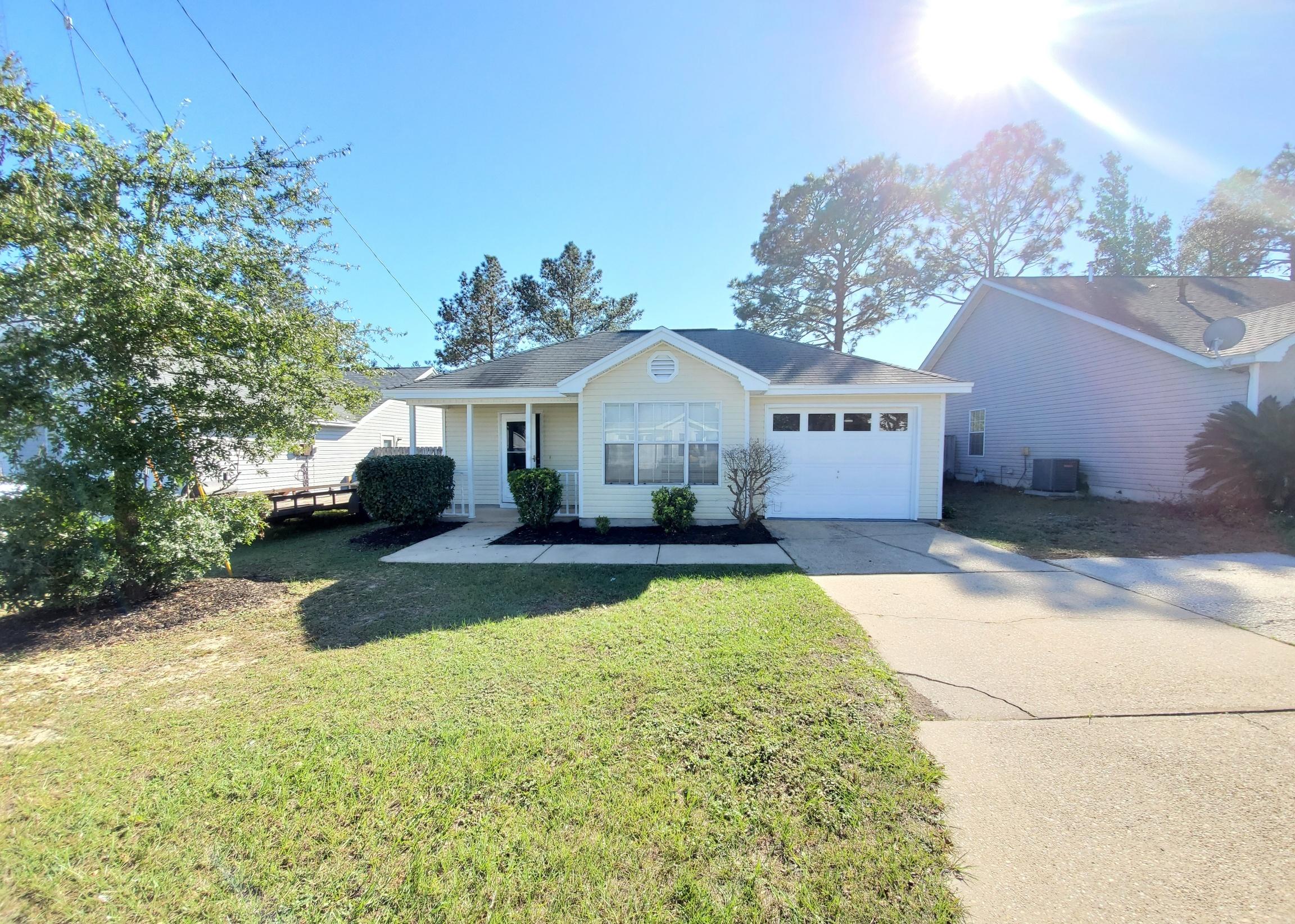 Adorable 3 bedroom 2 bath home for sale in Crestview. This property features a spacious living room with fireplace, breakfast nook, and roomy kitchen with lots of cabinet space. Fresh paint throughout. One car garage. Indoor laundry. Fenced in back yard. It is also getting a NEW ROOF! (On order). This property would make the perfect family home or rental. Vacant and easy to show!