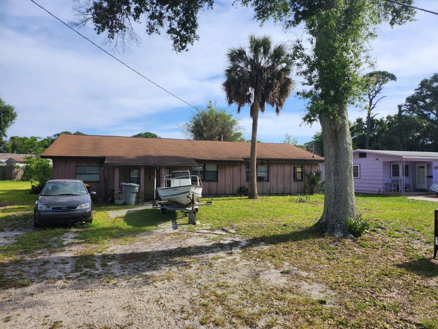 AS IS and will not qualify for conventional financing.  Buyer to verify all information deemed pertinent.  While this is centrally located, you will need lots of elbow grease to empty the house of its contents to get to the nitty gritty of the home.