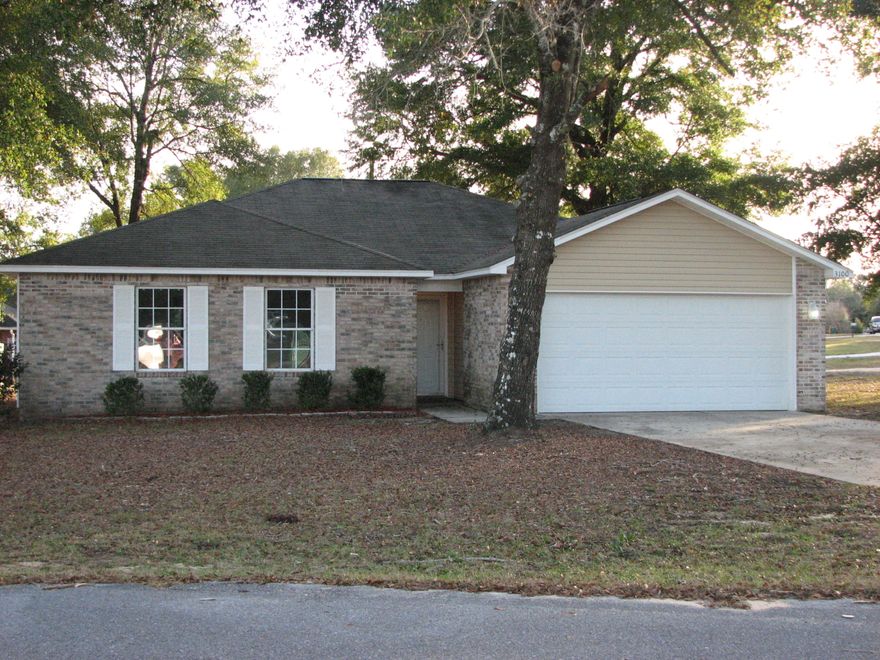 Great starter home in move in condition, the home sits on a nice, level corner lot with large shade trees and access from 2 roads for extra parking and storage for RV, boat etc. The interior features the following new items, paint, carpet in bedrooms, laminate in living area and kitchen, faucets and fixtures in bathroom, some lighting was also updated as well as all new appliances. The home has a split bedroom plan with tray ceilings in living and master bedroom. Recessed lighting in living area. The home has a transferable termite bond.