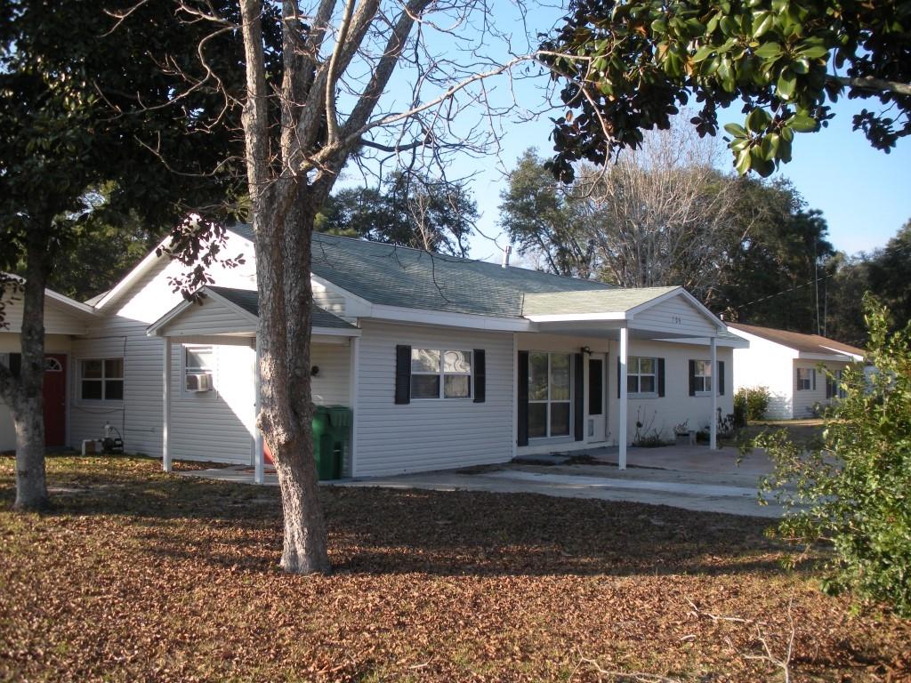 Need an in-law quarters, or how about plenty of space for a home daycare? You MUST see upgrades to this 5 bed / 2 bath solid concrete block home! Int. rates are likely to start creeping up, so buy your spacious home, NOW! Owner installed a brand new 4 ton outside compressor in July, '14! 2 bedrms are split from the other 3, so it can be used for an in-law quarters with its own entry, or an in-home day care! Many upgrades have been made to this home to make it more modern and energy efficient! New double-paned windows have replaced the old single-paned ones! A new heat pump HVAC system was added to the back of the home since 2010! The kitchen boasts nearly new & resurfaced solid oak cabinets, granite counters and durable ceramic tile that extends to the dining room! (Pls Click on ''More
