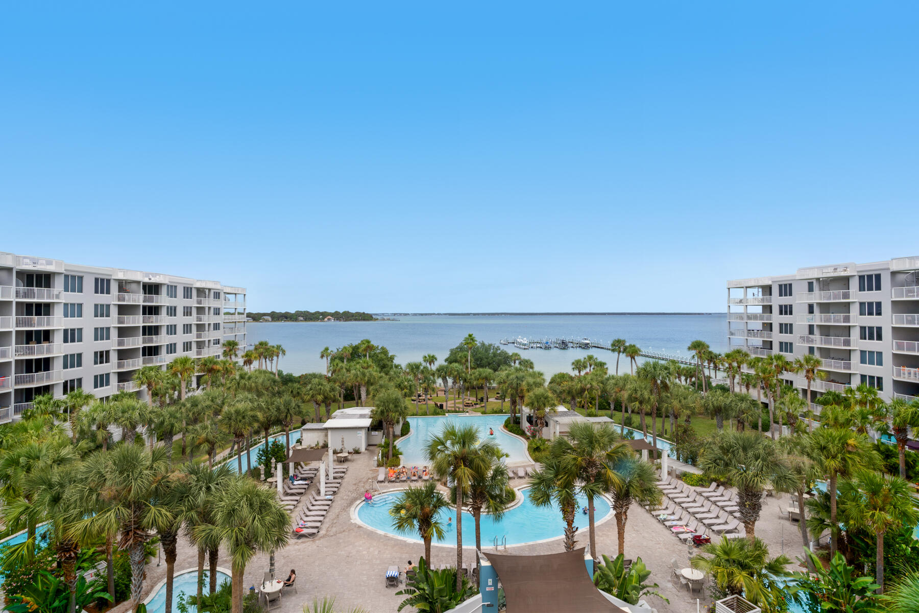 Don't miss this one! Priced to sell! Beautiful 1 bedroom + bunk room updated end unit, located in the Destin West Pelican building. Amazing bay and gulf views from this unit. Destin West is the perfect getaway...offering something for every age! Destin West is an amenity rich complex, featuring lazy river, multiple heated pools (both gulf side and bay side), fitness center, hot tubs, and fantastic beach access. This unit is perfect for a primary residence, personal vacation getaway, or stellar rental property.