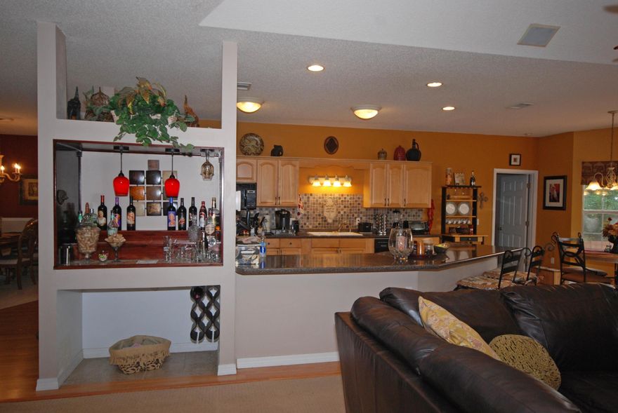 Beautiful, custom built home on Beaver Pond in Gulf Breeze! This home is truly one of a kind and sits on 0.71 acre (155x200 Lot), this is a quiet street and a bird lover's paradise! Sit on your covered front porch and enjoy the fabulous breezes and watch the kids play. This is a Jim Bozeman custom built home with an open floor plan with a split bedroom design. The kitchen has been recently updated and features new laminate flooring, a new tile back splash with custom stone design, and upgraded appliances including a new stainless steel refrigerator! The great room has a great flow into the kitchen and offers a cozy, corner gas fireplace. The bedrooms are all good size with neutral tones. Please call today to schedule a showing!