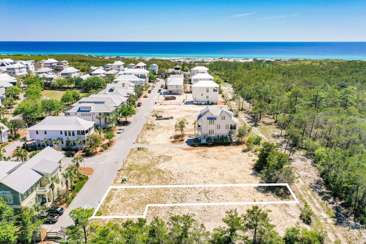 Two lots being sold together are perpendicular to each other allowing for extra parking space if wanted.