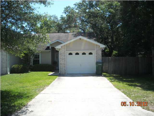 Great end unit, single story Townhouse. Home features raised ceilings and crown molding. Ceramic tile in the kitchen and baths. Dark wood laminate flooring the great room and master bedroom with carpeting in the additional bedrooms. Kitchen features glass top stove, built in microwave, breakfast bar, stainless steel refrigerator, and granite counter tops. Privacy fenced backyard with covered patio. Security system and yard building are AS IS. NO Smoking. Small pets allowed with owner approval and non refundable pet fee. This unit will not last long, call for a showing today!