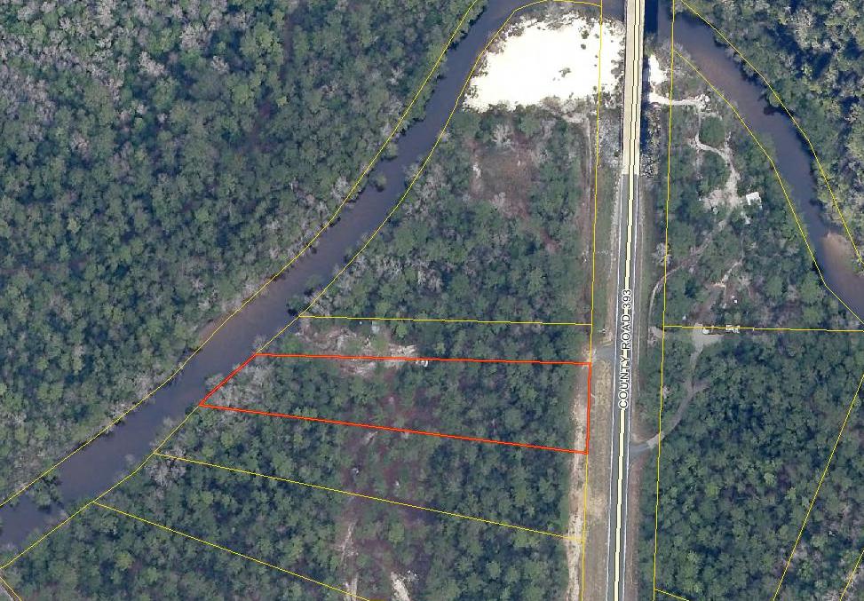 Beautiful lot located on Shoal River with approximately 105 foot of frontage on the river and approximately 125 foot of frontage on HWY 393. This would make a great get away property or fish camp.