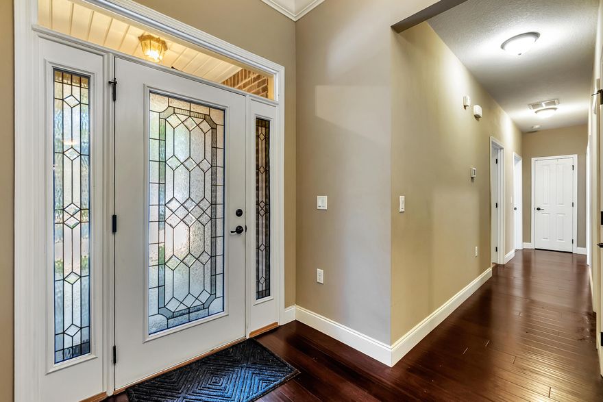 Convenient to Everything!  Only 6 miles to Hurlburt and 10 miles to Eglin AFB.  This beautiful home welcomes you with a huge parking amenity.  You can park 2 cars in the main driveway, and an additional 8 cars with the extended driveway that goes all the way to the street!  But back to the house, Beautiful weathered colored all brick one story with open floor plan, welcomes you with a 7 foot wide wood look ceramic tile foyer that extends into living areas; split floorplan and open concept. Recessed lighting in trey ceiling. Beautiful cabinetry with granite counters. Large covered patio and lots more to see.  Oversized washer and dryer are included. Make your appointment soon, your new home is waiting for you.