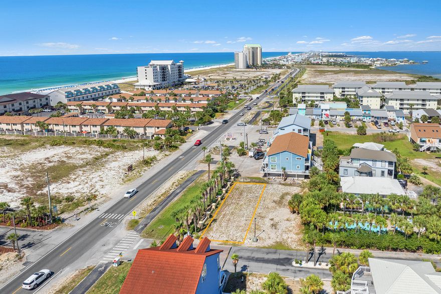 Gulf Views! Prime Commercial Lot on Navarre Beach - Zoned Navarre Beach CommercialInvestment opportunity on Navarre Beach! This commercially zoned lot is ideally located with public beach access directly across the road, offering high visibility and foot traffic.Under the current Navarre Beach Commercial zoning, a wide variety of uses are permitted -- including single-family homes, duplexes, multifamily dwellings, retail spaces, restaurants, and professional offices. Whether you're looking to build a boutique business or a residential income property, this lot provides the flexibility and location to make it happen.***All development must comply with Santa Rosa County setback requirements and be approved by The Village at Navarre HOA.