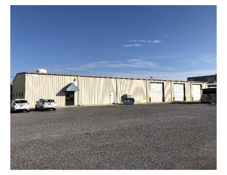 Well maintained and large warehouse unit that can be used for storage or fabrication. The building has three each of 14ft x 14ft roll up doors and one loading dock. It also has 3 phase power.