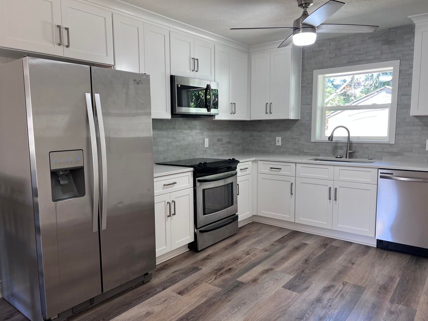 Completely renovated in Fall 2025, 16910 Castile Avenue offers a fresh modern look in one of Panama City Beach's most convenient west-end locations. Set on a generous 60  120 lot, this turnkey 1,517 sq ft home feels brand new inside and out with all-new flooring, interior and exterior paint, kitchen cabinets, appliances, and two fully updated bathrooms. The reimagined layout includes an enclosed garage bedroom with its own private bath, ideal as a lock-out suite, home office, or comfortable primary retreat--offering great flexibility for full-time living or investment use. Located just 1/2 mile to the beach and only 1 mile from Pier Park, this home sits in a short-term-rental-friendly area with no HOA, making it an excellent option for both personal enjoyment and rental income potential. Major system upgrades add peace of mind, including a new HVAC, new hot water heater, and new washer and dryer. With its top-to-bottom renovation, flexible floor plan, and unbeatable access to the coastline, shopping, and dining, this beautifully refreshed Panama City Beach home is truly move-in ready and primed for immediate enjoyment.
