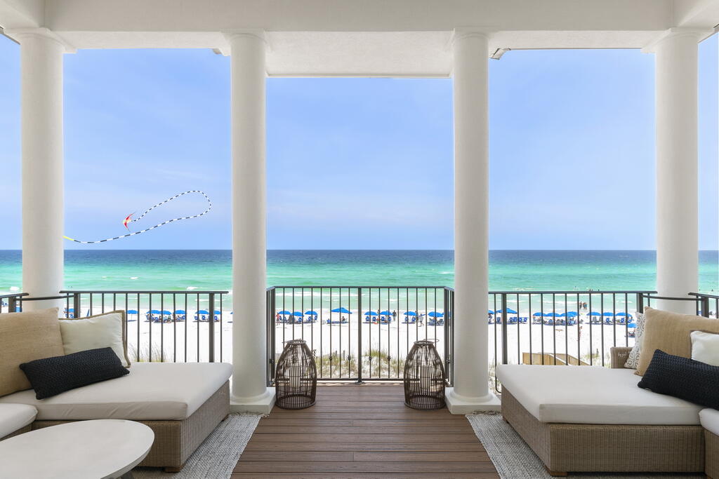 Prominently perched on the water in the private, gated community of Destiny by the Sea, 4748 Ocean Boulevard is a Gulf-front home that offers uninterrupted views of the shoreline and a layout that just makes sense.From the moment you step inside, it's clear the home was designed around the view. Floor-to-ceiling windows stretch across the main floor, filling the space with natural light and making nearly every seat a front-row view of the emerald coastline along the Gulf of America. It's hard not to imagine slow mornings with coffee on the covered veranda or sunset dinners with friends while the waves gently roll below.