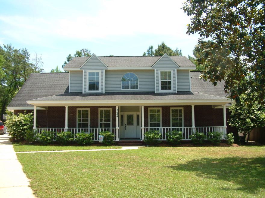 Rare opportunity in Village of Bolton. The sellers are now offering $4000 buyer closing cost assistance with an acceptable offer. This one won't last long. Enjoy the Southern charm of this quite neighborhood from your huge front porch. This wonderful home features a large open floor plan with all the modern conveniences. A top grade kitchen with an oversized island is the chefs' delight. A casual living area is perfect for entertaining. The master bedroom and one additional bedroom and bath are on the main level with two additional bedrooms and a full bath upstairs. A recently added enclosed pool along with the lanai make the large backyard a summer time oasis. Buyer to verify any items they deem important.