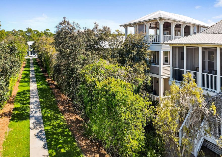 Never Rented! The Beachcomber is a meticulously maintained beach house with many upgrades. Four large bedrooms and a bonus room. TWO MASTER SUITES. Every bedroom has its own private balcony. Lifeproof flooring throughout the house for easy maintenance. The wood decks and railing have been upgraded with Trex decking to make sure you never need to repair or paint. Bahama hurricane shutters add to the aesthetics and protection. The home backs up to a nature trail just a short walk from a large resort pool and recreation area. DEEDED BEACH ACCESS! The bonus room can be a fifth bedroom and is equipped with built-ins, refrigerator and sink. A large top floor deck (also Trex) is ready for many beautiful 30a sunsets.
