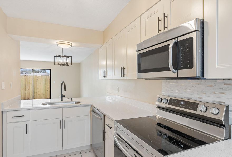 Time to take another look at this investment opportunity. A new front door was just installed along with other improvements. Everything like new! The super low HOA fee of only $77 a month makes this unit more affordable than most. Recently renovated, this unit boasts all the right updates: brand new HVAC system, new upstairs luxury vinyl plank flooring in the bedrooms, elegant high-end kitchen cabinets and quartz countertops, new bathroom vanities with quartz counters, top-notch DELTA fixtures in the bathroom, new toilets, new Samsung Glass Top 5 Burners 6.3-cu ft Self & Steam Cleaning Freestanding Smart Electric Range (Stainless Steel), and brand new Samsung Top Control Built-In Dishwasher (Fingerprint Resistant Stainless Steel) ENERGY STAR, 53-dBA Standard Sound Level All windows and sliding glass doors have new glass, and there are all new light fixtures, electrical switches, and receptacles, with fresh wall and ceiling textures and paint. The roof and water heater were replaced in 2019. Plus, there's a new privacy fence in the rear. This unit offers a very comfortable living space for a full-time owner-occupant or a great rental investment property. The community includes a pool and picnic area, and the location is extremely convenient with quick access to Destin, Fort Walton Beach, and Miramar Beach. With many parks and beach access points nearby, affordable housing can be hard to find in Destin. This unit checks all the right boxes if you want to live close to where you work.