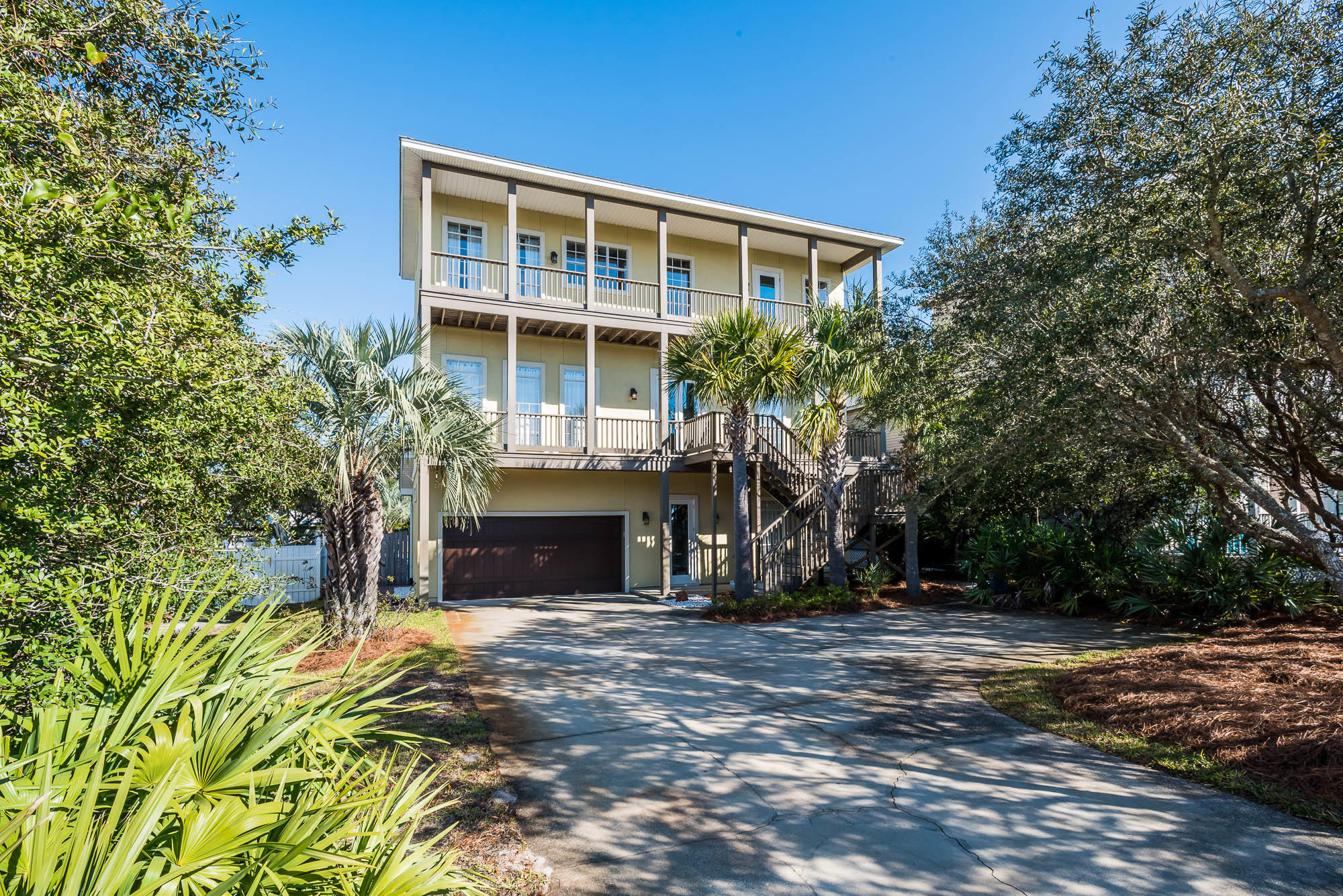 Another substantial price reduction of $50,000! Great Gulf views from Seacrest Beach House with sizable fenced yard and private pool. 2 easy, direct community beach accesses only a short stroll. Expansive balconies off 3rd floor living area and 2nd floor Master and 2nd Bedrooms provide for ultimate relaxation. 2 car garage with additional storage. Numerous windows provide plenty of natural light. Walk-in closets, custom tile, recessed LED lighting, and 10' ceilings throughout. Distressed new heart pine flooring adorns the living area. Gourmet kitchen features all stainless appliances, granite counter tops and custom soft close cabinets. 4th bedroom on top floor may be utilized as den, office or playroom. Elevator installation possible. Much rental potential. Premier location near