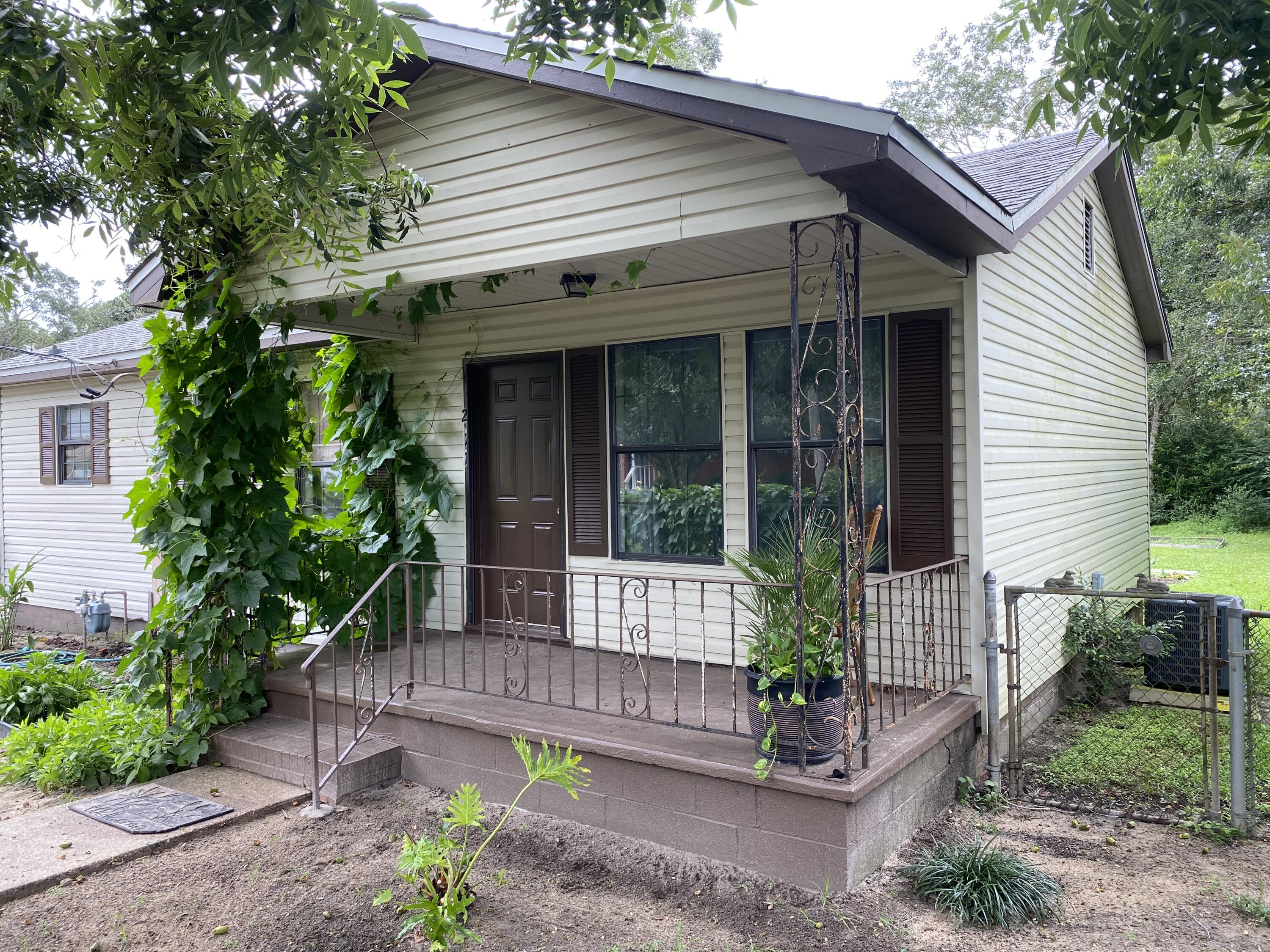 This super cute 2 bedroom, 1 batch home is your own garden oasis. Inside, you will find lvp flooring, new paint, and a large living area. The HVAC is only 4 years old. There are blueberry bushes, various fruit trees, and herbs planted throughout the lot.There is also a detached 2 car cinder block garage at the end of the driveway. (garage roof needs replacing)Make your appointment today to come see this quaint property.