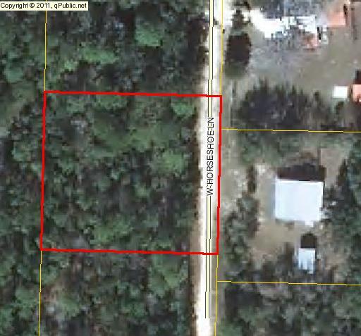 Half acre lot, just off paved road, in a perfect location for a manufactured home or new home. (restricted against single wide mobile homes). Wooded lot, level and ready to be built on.