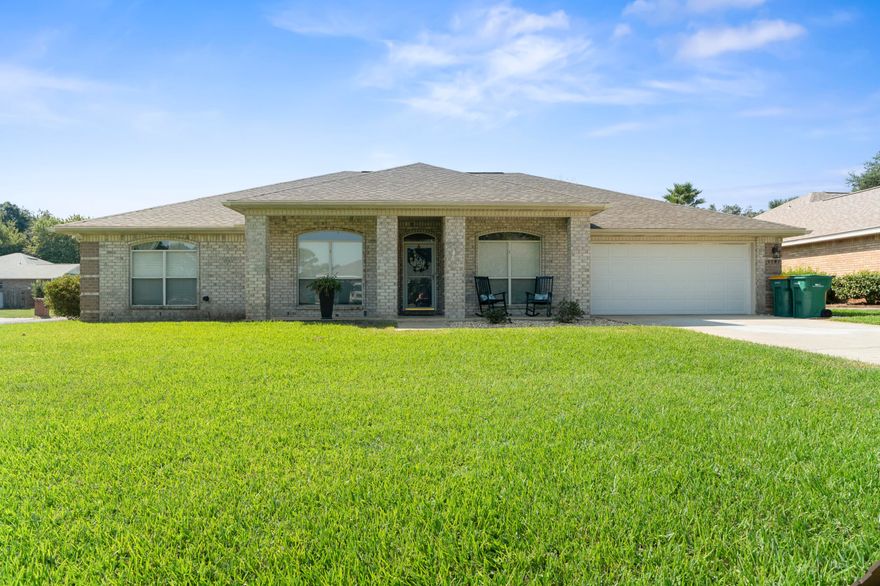 Charming, well kept, remodeled brick home on corner lot. Must see spacious and inviting kitchen, featuring plenty of natural light, eating area, updated counter tops, double ovens, and stainless steel appliance! The home also features newer windows and a newer roof; as well as a large master suite with captivation custom walk in shower, a formal dining room, fireplace, and study/ office area. Cozy private fully fenced backyard. Conveniently located near beaches, bay, and shopping.