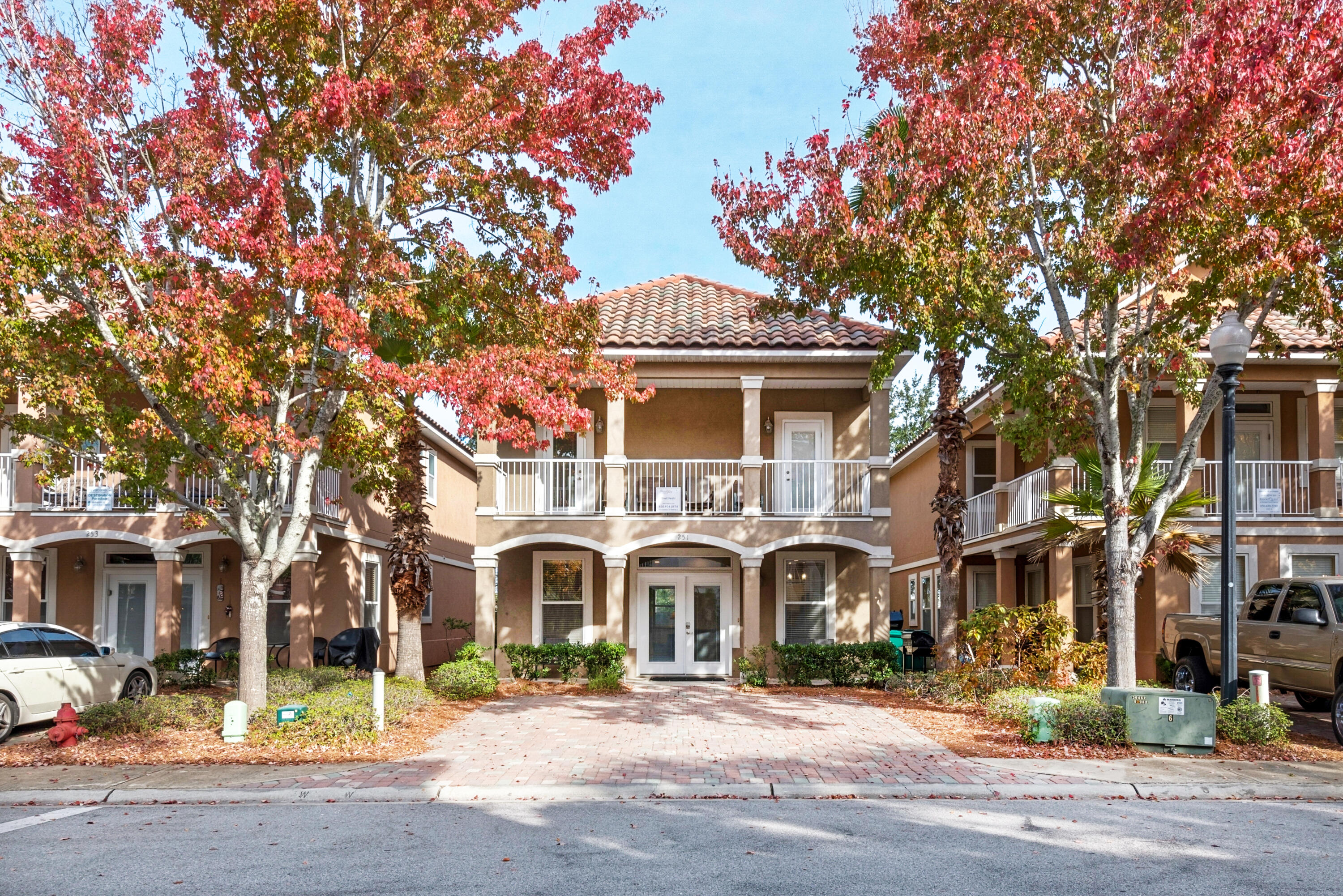 Welcome Home! This spacious and stunning Destin beach home features both modern amenities and architectural character in a fantastic gated beach community. A short term rental machine boasting a phenomenal rental history. The remarkable $100,000 remodel is complete and ready for your family, friends and vacationing guests. The alluring modern kitchen features gorgeous wrap-around quartz countertops, storybook shaker cabinets, stainless steel appliances, a beautiful backsplash and shiplap walls. Sold fully furnished! Decorated w/ a coastal elegant furniture collection, the tranquil decor provides the ultimate 'vacation' experience. 1st Floor master bedroom ensuite.  Follow the hand-crafted staircase and shiplap walls upstairs to enjoy spanning sunrises from your deluxe size private balcony.